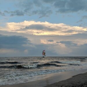 Alyosha sailing catamaran with Maryland spinnaker offshore on The Big Blue trip
