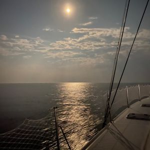 Full moon reflecting on ocean during moonlight cruise Ocean City Maryland