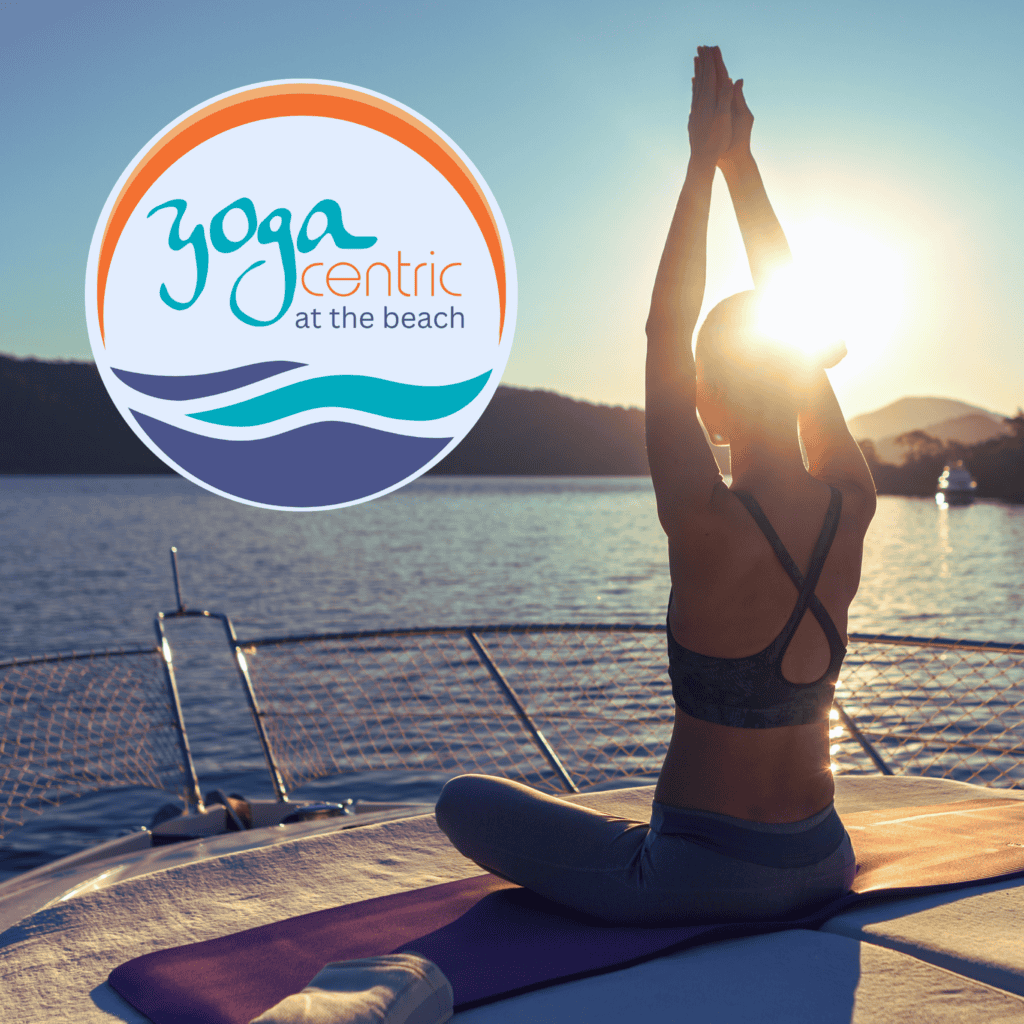 Woman practicing yoga on Alyosha catamaran deck at sunrise during Anchored in Nature yoga sailing experience in Ocean City
